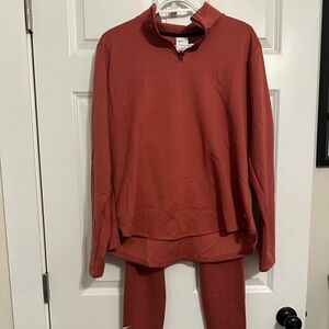 Nike Pullover. Cinnamon in color with White Logo. Matching pants. Like new!